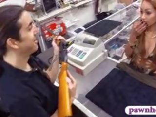 Crazy Latin Bitch Tries To Sell Her Gun She Brought In